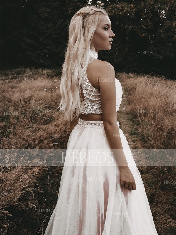 Elegante vestido de fiesta de corte A, sin mangas, cuello alto, tul con cuentas y largo hasta el suelo