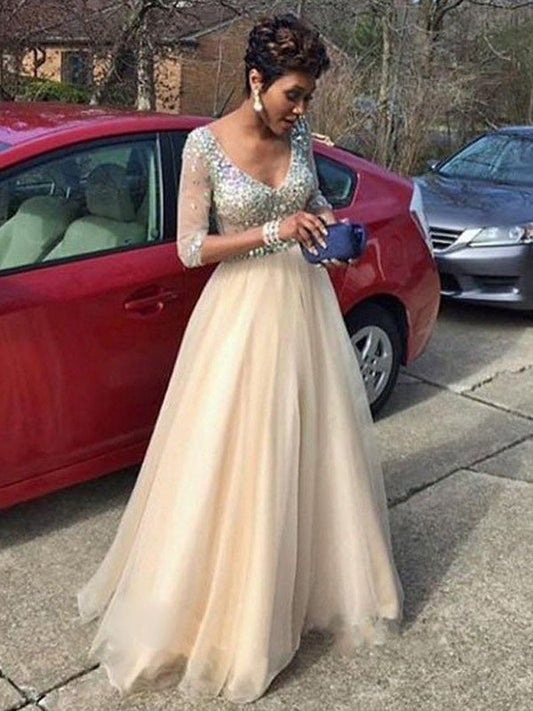 Elegante vestido de fiesta de tul con escote en V, mangas largas, cuentas y largo hasta el suelo
