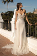 Increíble vestido de novia de tul con cola capilla y espalda abierta y corte sirena largo