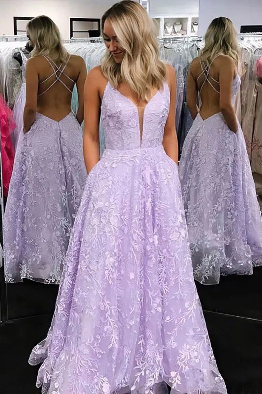 Erstaunliches A-Linien-Ballkleid aus Spitze, Tüll, Spaghettiträgern und Taschen