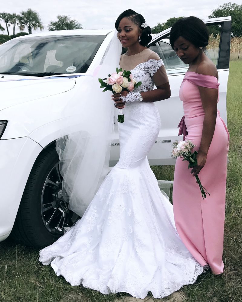 Vestido de novia de sirena con apliques de tul transparente y plisado