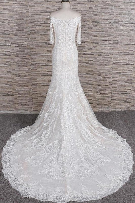 Impresionantes vestidos de novia elegantes con apliques y cola de corte sirena