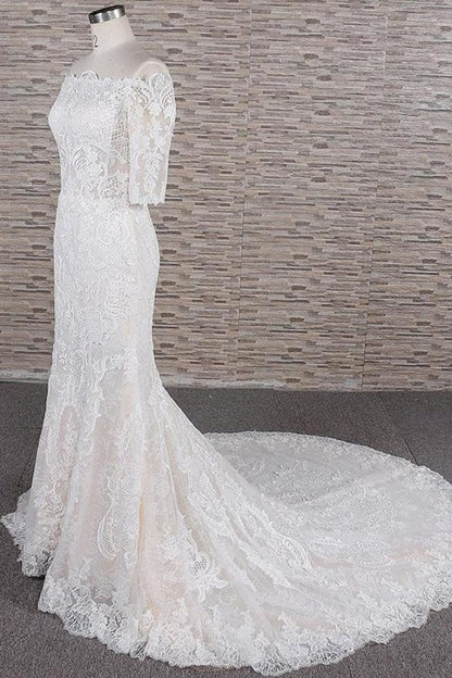 Impresionantes vestidos de novia elegantes con apliques y cola de corte sirena
