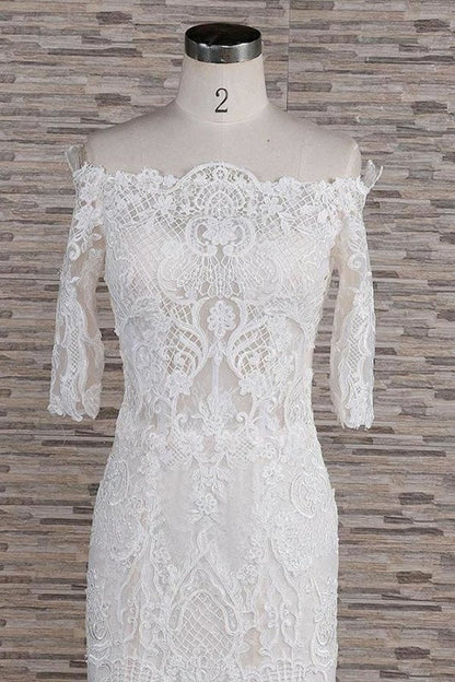 Impresionantes vestidos de novia elegantes con apliques y cola de corte sirena