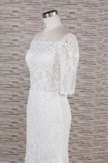 Impresionantes vestidos de novia elegantes con apliques y cola de corte sirena