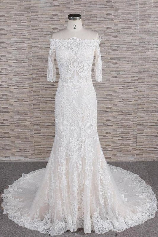 Impresionantes vestidos de novia elegantes con apliques y cola de corte sirena