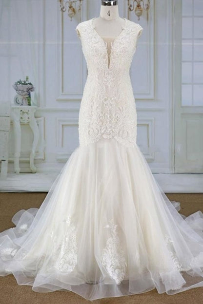 Impresionantes apliques de tul con corte sirena para vestidos de novia elegantes