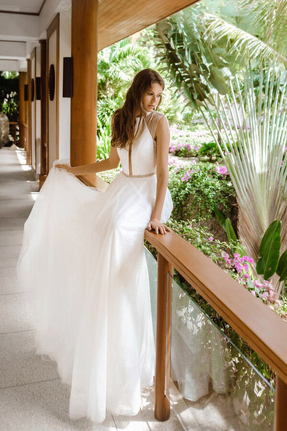 Fantastisches langes Brautkleid in A-Linie mit Perlenbesatz und offenem Rücken aus Tüll