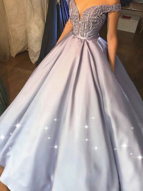 Vestidos de fiesta largos hasta el suelo sin mangas con hombros descubiertos y satén con cuentas