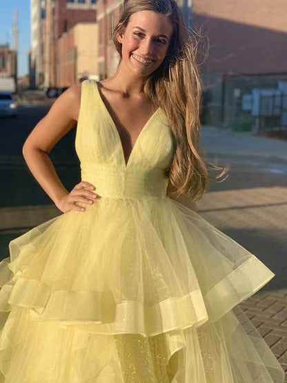 Vestidos de fiesta de organza sin mangas con volantes y escote en V hasta el suelo