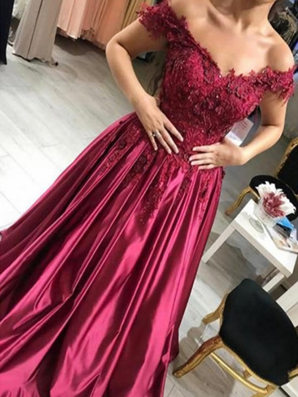 Vestido de fiesta sin mangas con hombros descubiertos, apliques de satén y largo hasta el suelo