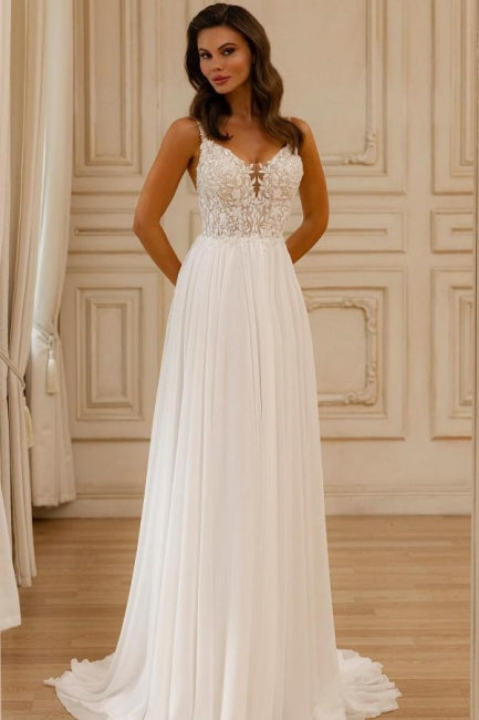 Hermoso vestido de novia blanco sin mangas con escote en V, encaje y apliques.