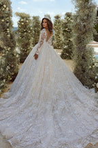 Hermoso vestido de novia de tul con apliques de encaje y escote en V en forma de A y mangas largas