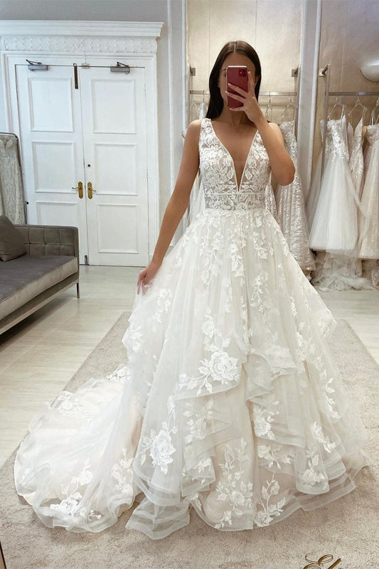 Wunderschönes weißes ärmelloses A-Linien-Brautkleid mit V-Ausschnitt und Schleppe