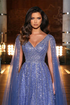 Hermoso vestido de noche azul largo de corte A con escote en V y volantes con cuentas