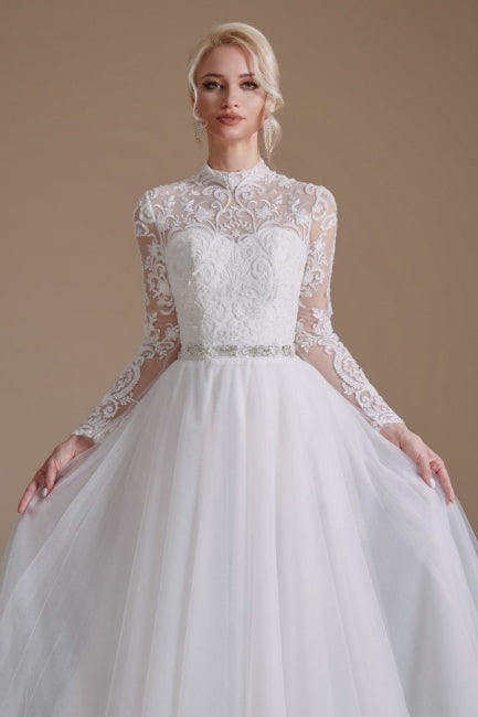 Hermosos vestidos de novia con escote joya, manga larga, corte A y largo hasta el suelo con estampado