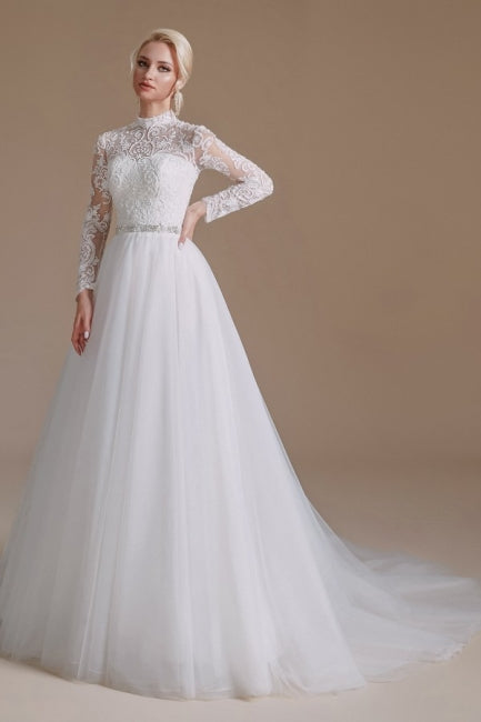 Hermosos vestidos de novia con escote joya, manga larga, corte A y largo hasta el suelo con estampado