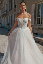 Hermoso vestido de novia largo de tul con apliques y hombros descubiertos en forma de A