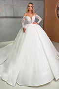 Hermoso vestido de novia de manga larga con escote corazón y cuentas