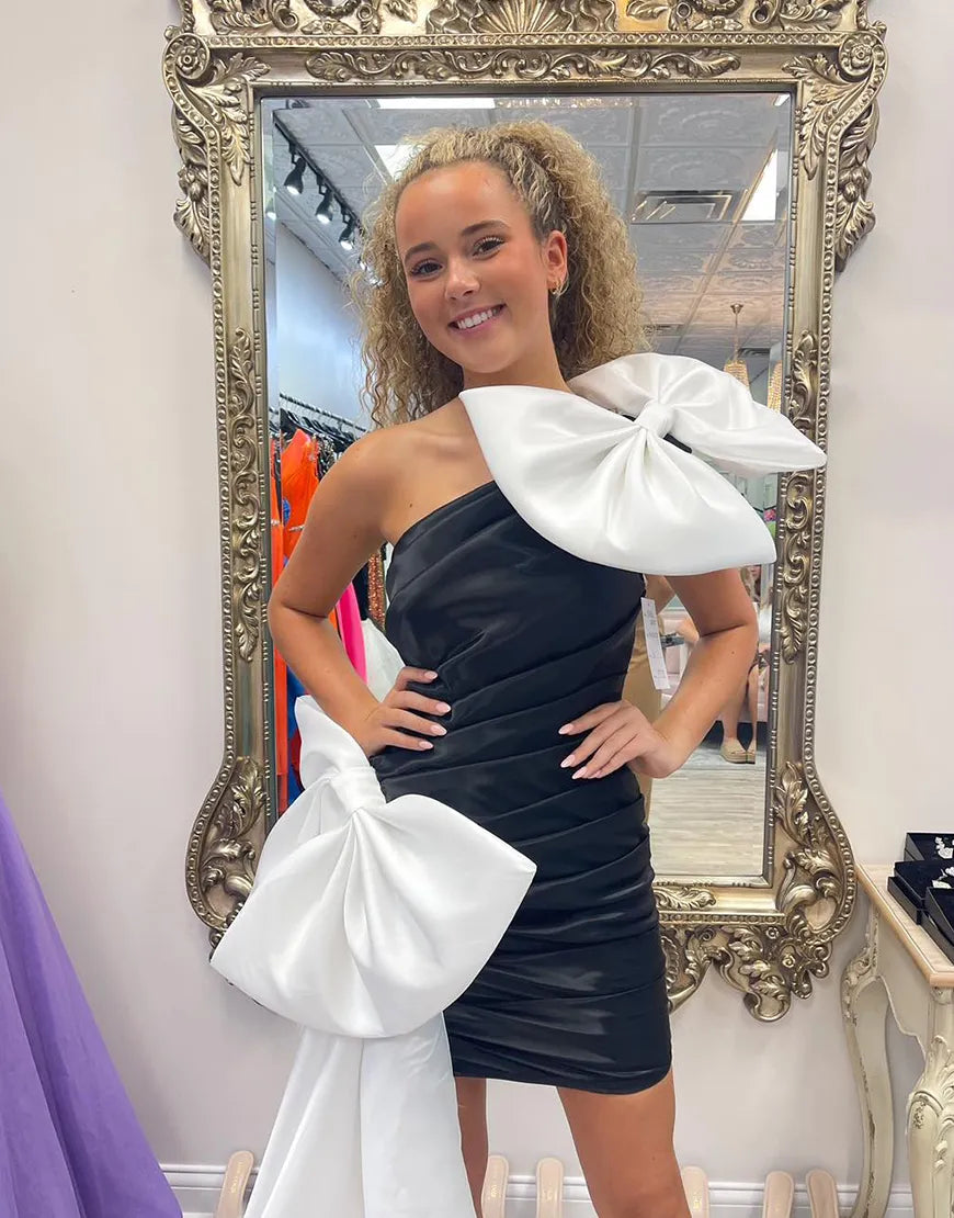 Vestido de fiesta negro ajustado de un solo hombro con lazos blancos