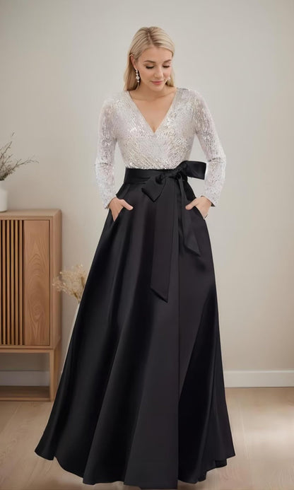 Langärmliges Kleid mit Schleife, Paillettenoberteil und Schleife