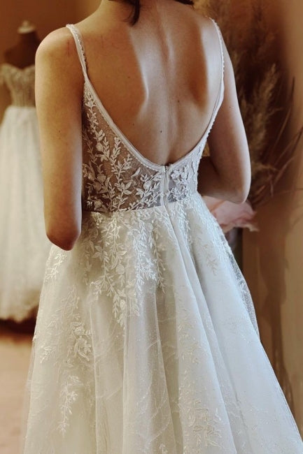 Vestidos de novia bohemios de corte A, escote en V, espalda descubierta, sin mangas y con encaje