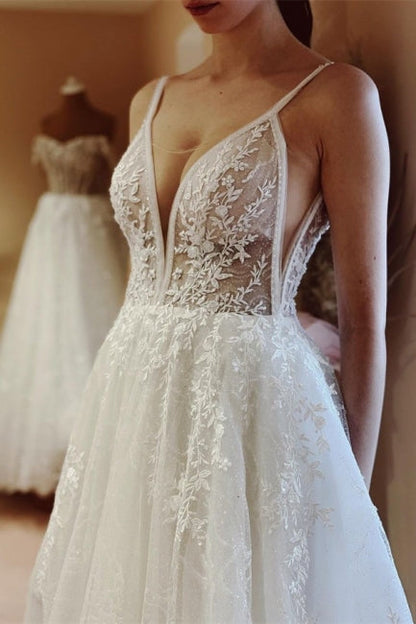 Vestidos de novia bohemios de corte A, escote en V, espalda descubierta, sin mangas y con encaje