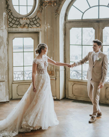 Vestido de novia bohemio largo de tul con corte en A y apliques de encaje