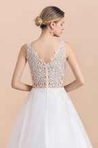 Vestido de novia bohemio largo de corte A con escote en V, tirantes finos, apliques de tul y encaje