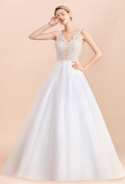 Vestido de novia bohemio largo de corte A con escote en V, tirantes finos, apliques de tul y encaje