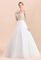 Vestido de novia bohemio largo de corte A con escote en V, tirantes finos, apliques de tul y encaje