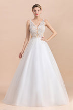Vestido de novia bohemio largo de corte A con escote en V, tirantes finos, apliques de tul y encaje