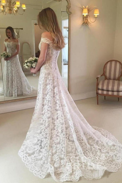 Vestido de novia bohemio largo de sirena con hombros descubiertos y encaje