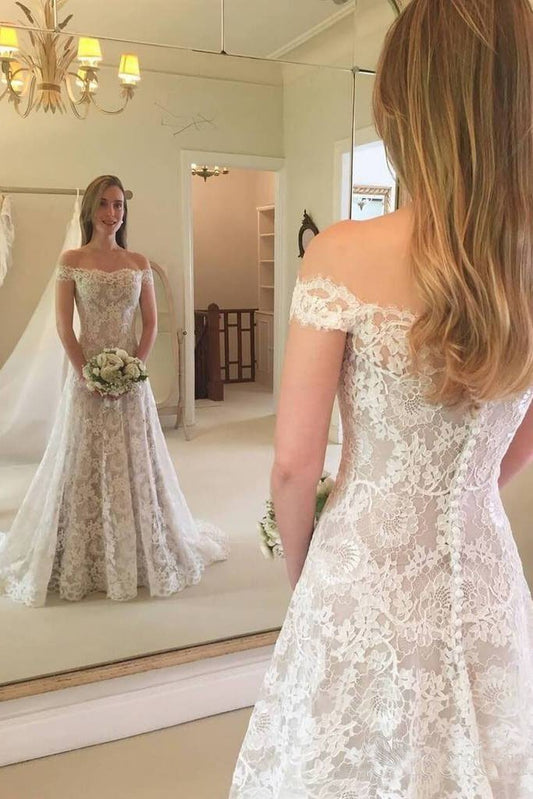 Vestido de novia bohemio largo de sirena con hombros descubiertos y encaje