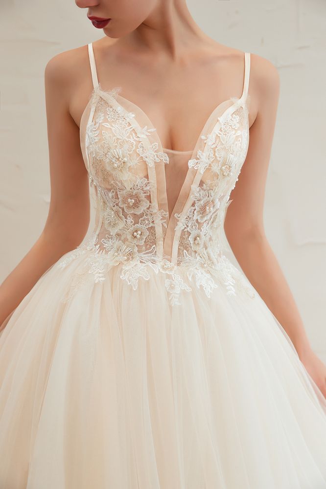Vestido de novia bohemio de tul con tirantes finos color marfil