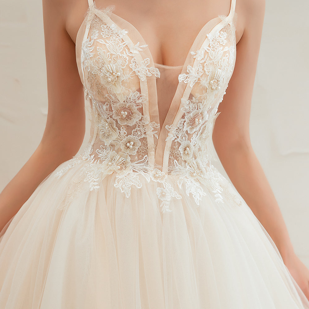 Vestido de novia bohemio de tul con tirantes finos color marfil