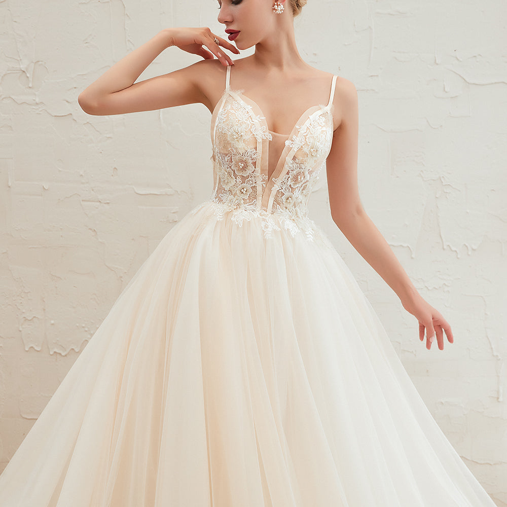 Vestido de novia bohemio de tul con tirantes finos color marfil