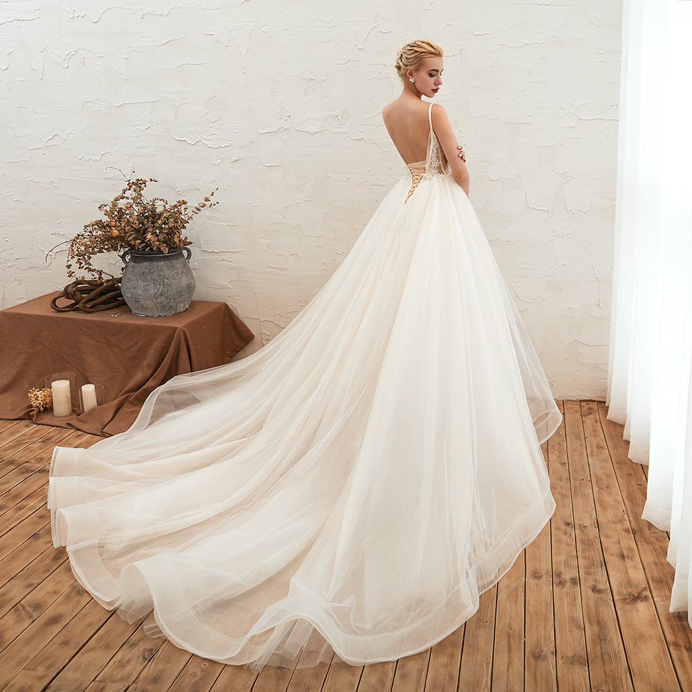 Vestido de novia bohemio de tul con tirantes finos color marfil
