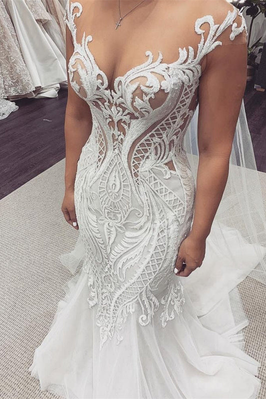 Vestido de novia de sirena con mangas cortas y encaje
