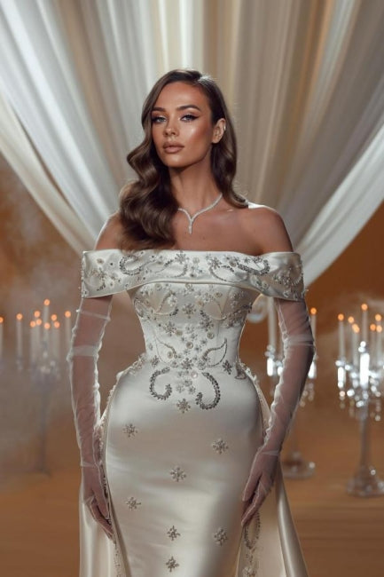 Vestido de novia encantador de satén con un solo hombro, sin mangas y con apliques en la cola