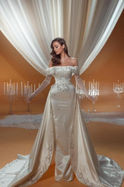 Vestido de novia encantador de satén con un solo hombro, sin mangas y con apliques en la cola