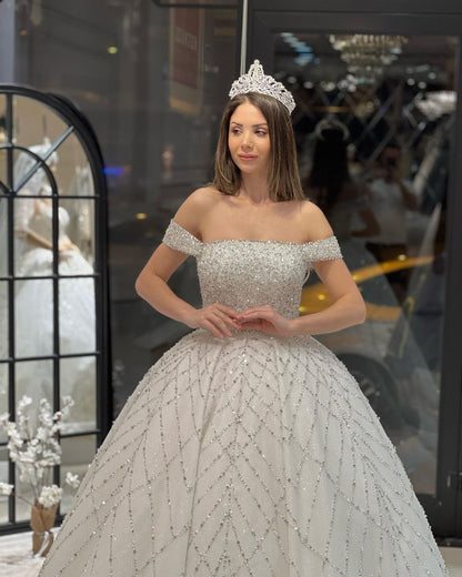 Vestido de novia encantador, largo hasta el suelo, con hombros descubiertos, corte A, lentejuelas y cola de corte.
