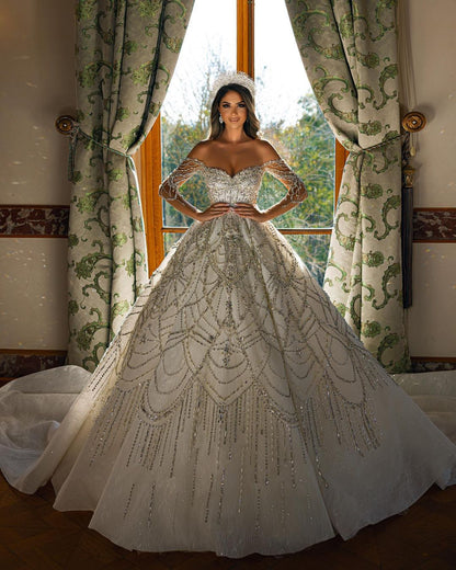 Vestido de novia encantador de encaje con escote en forma de A y mangas largas hasta el suelo