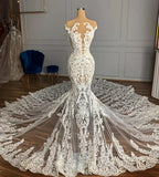 Vestido de novia de tul con apliques y corte sirena, sin mangas y con diseño de jardín de joyas
