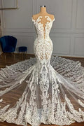 Vestido de novia de tul con apliques y corte sirena, sin mangas y con diseño de jardín de joyas