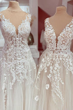 Vestido de novia encantador de tul con encaje, apliques y escote en V y corte A largo