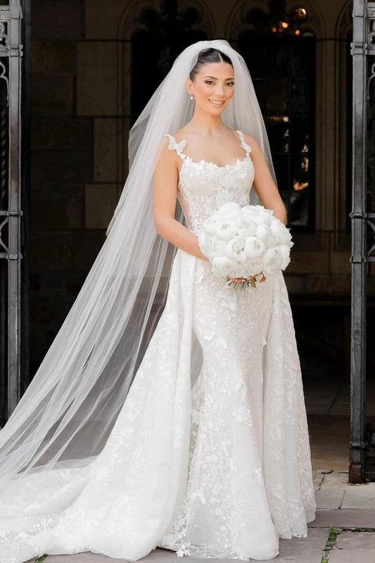 Encantador vestido de novia largo color marfil sin mangas de encaje con cola desmontable