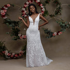Vestido de novia de sirena con encaje sin mangas y retrato encantador