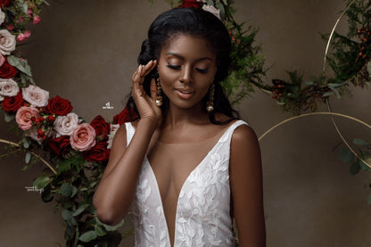 Vestido de novia de sirena con encaje sin mangas y retrato encantador