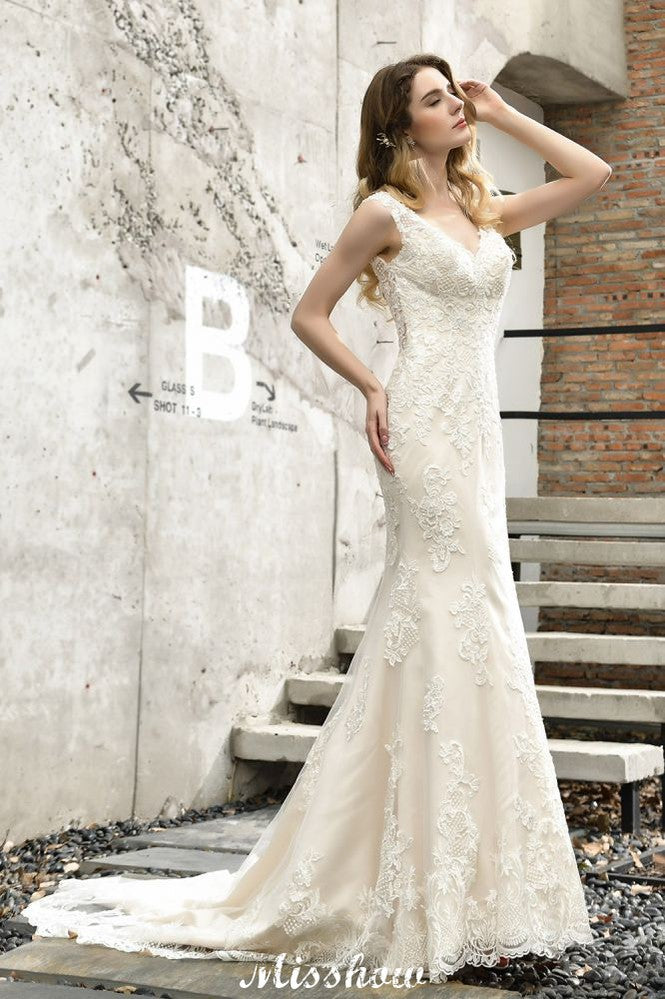 Vestido de novia de sirena con escote en V y encaje floral, sin mangas